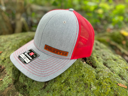 leather patch hat red grey buckeye text