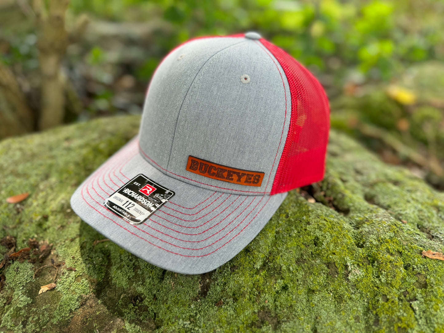 leather patch hat red grey buckeye text