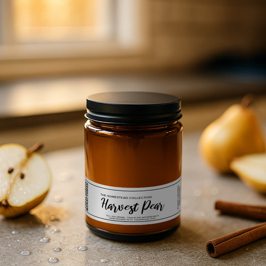 Harvest Pear candle on counter with water drops, fresh pair slices and cinnamon sticks